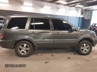 2007 Honda Pilot EX-L z VIN 2HKYF18687H533288, wystawiony jako IAAI lot #42046152 z przebiegiem 165 953 mil mil oraz . Historia ofert i sprzedaży dostępna na DreamBid. Obrazek 13.