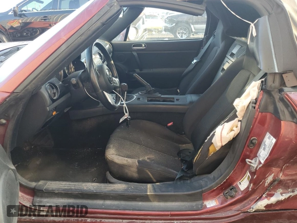 2007 Mazda MX-5 Miata Sport z VIN JM1NC25F970124896, wystawiony jako Copart lot #83624394 z przebiegiem 62 735 mil mil oraz Szkoda całkowita • Salvage title. Historia ofert i sprzedaży dostępna na DreamBid. Obrazek 7.