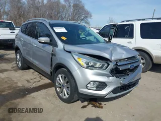 2017 Ford Escape Titanium with VIN 1FMCU0JD3HUB13234, listed as a IAAI auction lot 41760944 with 113,361 mi miles. Bid and sale history available at carsss.com. Image 1.