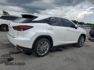 2021 Lexus RX 350 with VIN 2T2JZMDA5MC299559, listed as a Copart auction lot 60450495 with 24,390 mi miles and Salvage title. Bid and sale history available at DreamBid. Image 3.