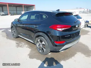 2017 Hyundai Tucson Value with VIN KM8J33A25HU586191, listed as a IAAI auction lot 41682127 with 58,877 mi miles. Bid and sale history available at carsss.com. Image 3.