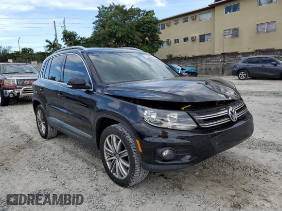 2014 Volkswagen Tiguan SE with VIN WVGAV3AXXEW543245, listed as a Copart auction lot 42288905 with 92,851 mi miles and Salvage title. Bid and sale history available at DreamBid. Image 4.