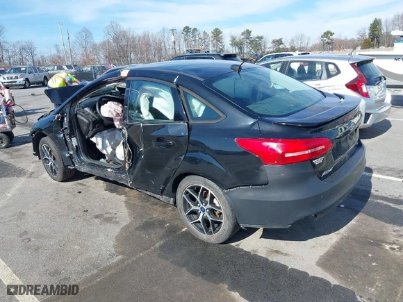 2016 Ford Focus SE with VIN 1FADP3F23GL304834, listed as a IAAI auction lot 41455806 with 1 mi miles. Bid and sale history available at carsss.com. Image 3.