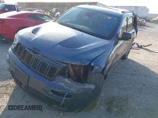 2021 Jeep Grand Cherokee 80th Anniversary with VIN 1C4RJFBG5MC827059, listed as a IAAI auction lot 40958909 with 38,000 mi miles and . Bid and sale history available at DreamBid. Image 17.