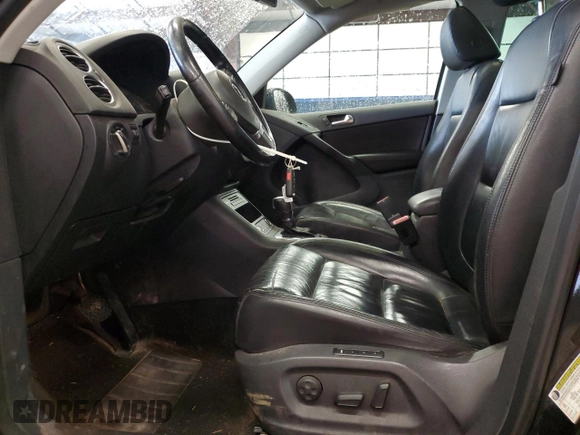 2011 Volkswagen Tiguan SE with VIN WVGBV7AX4BW514296, listed as a Copart auction lot 55170155 with 151,068 mi miles and Clean Title. Bid and sale history available at DreamBid. Image 7.