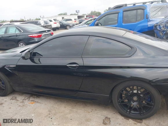 2013 BMW M6 with VIN WBSLX9C50DC968777, listed as a IAAI auction lot 41966918 with 113,458 mi miles. Bid and sale history available at carsss.com. Image 14.
