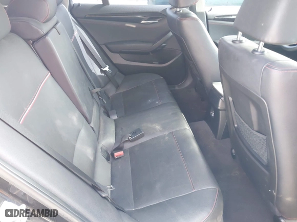 2015 BMW X1 sDrive28i with VIN WBAVM1C59FVW57928, listed as a IAAI auction lot 42056452 with 115,411 mi miles. Bid and sale history available at carsss.com. Image 8.