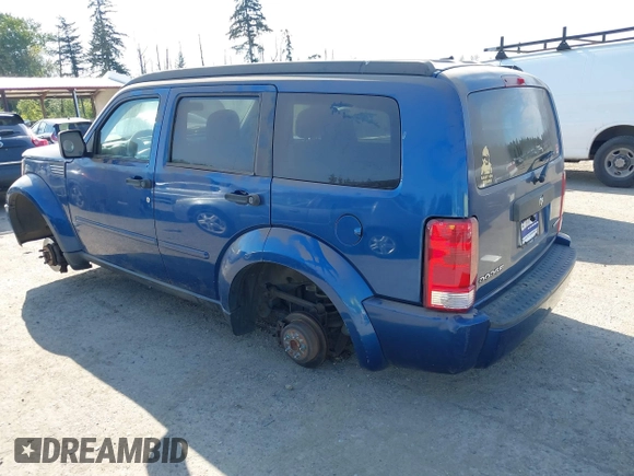 2010 Dodge Nitro SE with VIN 1D4PT2GK4AW141616, listed as a IAAI auction lot 42183953 with 128,023 mi miles. Bid and sale history available at carsss.com. Image 3.