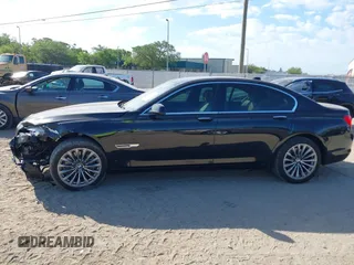 2012 BMW 7 Series 740i with VIN WBAKA4C51CC613636, listed as a IAAI auction lot 41908801 with 127,725 mi miles and . Bid and sale history available at carsss.com. Image 15.