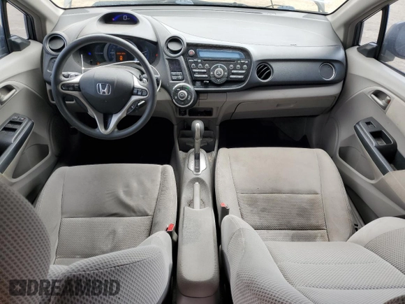 2011 Honda Insight EX with VIN JHMZE2H77BS006079, listed as a Copart auction lot 63873985 with 134,159 mi miles and Salvage title. Bid and sale history available at DreamBid. Image 8.