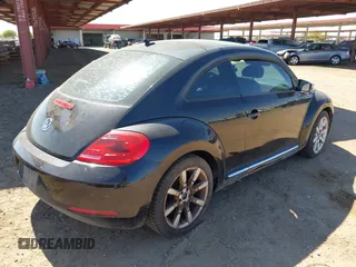 2013 Volkswagen Beetle 2.5L with VIN 3VWJP7ATXDM679115, listed as a IAAI auction lot 42212965 with Not Provided miles and . Bid and sale history available at DreamBid. Image 4.