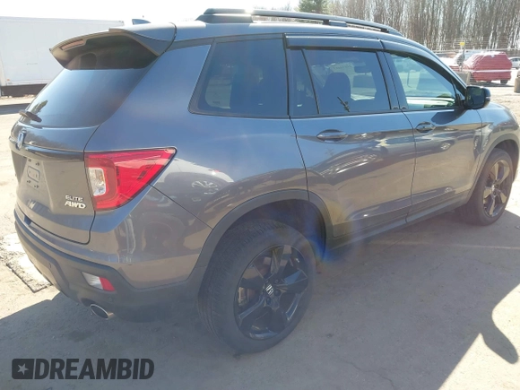 2021 Honda Passport Elite with VIN 5FNYF8H07MB018359, listed as a IAAI auction lot 41834413 with 28,278 mi miles and . Bid and sale history available at DreamBid. Image 4.