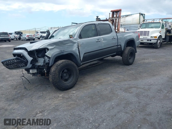 2018 Toyota Tacoma SR5 with VIN 3TMDZ5BN3JM039497, listed as a IAAI auction lot 42326823 with 92,977 mi miles and . Bid and sale history available at DreamBid. Image 2.