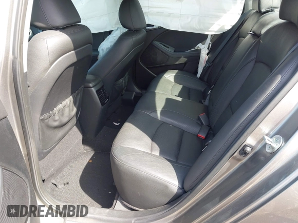 2014 Kia Optima SXL Turbo with VIN 5XXGR4A62EG323308, listed as a IAAI auction lot 42069853 with 118,168 mi miles and . Bid and sale history available at DreamBid. Image 8.