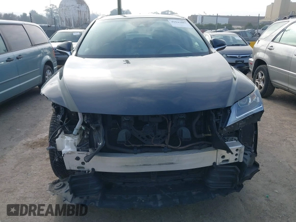 2016 Lexus RX 450h with VIN 2T2BGMCA3GC003065, listed as a IAAI auction lot 41043087 with 89,077 mi miles and . Bid and sale history available at DreamBid. Image 13.