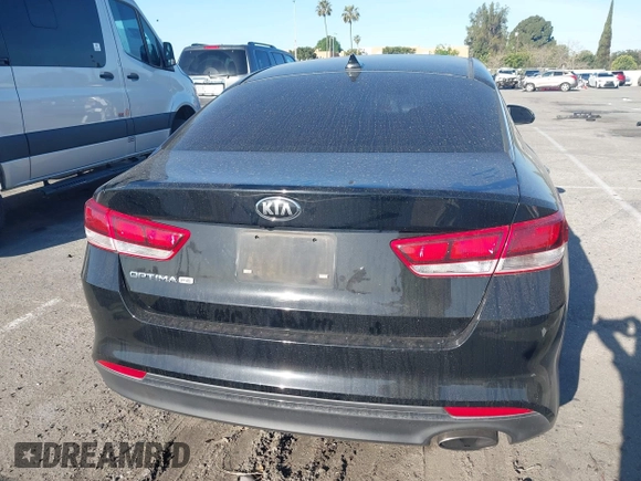 2017 Kia Optima LX with VIN 5XXGT4L30HG152700, listed as a IAAI auction lot 41826259 with 143,438 mi miles. Bid and sale history available at carsss.com. Image 16.