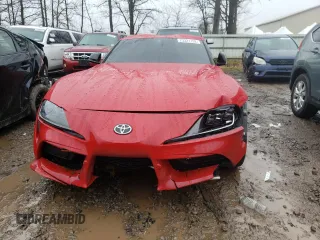 2021 Toyota Supra 3.0 z VIN WZ1DB0C02MW044450, wystawiony jako Copart lot #73321152 z przebiegiem Nie podano mil oraz . Historia ofert i sprzedaży dostępna na DreamBid. Obrazek 5.