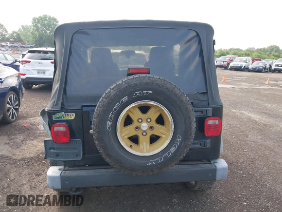 2006 Jeep Wrangler Sport z VIN 1J4FA49S06P721223, wystawiony jako IAAI lot #42654272 z przebiegiem 225 223 mil mil oraz . Historia ofert i sprzedaży dostępna na DreamBid. Obrazek 16.