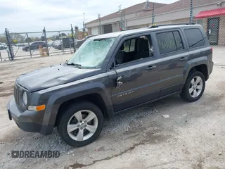 2014 Jeep Patriot Latitude with VIN 1C4NJRFB3ED731313, listed as a IAAI auction lot 42161426 with 118,858 mi miles and . Bid and sale history available at DreamBid. Image 2.