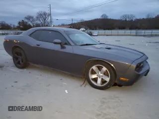 2014 Dodge Challenger R/T Plus z VIN 2C3CDYBT5EH160826, wystawiony jako Copart lot #82748844 z przebiegiem 160 152 mil mil oraz Szkoda całkowita • Salvage title. Historia ofert i sprzedaży dostępna na DreamBid. Obrazek 4.