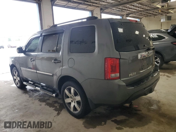 2013 Honda Pilot Touring z VIN 5FNYF3H93DB019252, wystawiony jako Copart lot #64631715 z przebiegiem 134 343 mil mil oraz Szkoda całkowita • Salvage title. Historia ofert i sprzedaży dostępna na DreamBid. Obrazek 2.