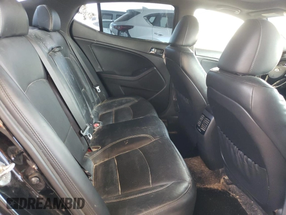 2013 Kia Optima SX с VIN 5XXGR4A65DG190896, выставлен на аукционе Copart как лот 59630485 с пробегом 136 385 миль миль и Списание • Salvage title. История ставок и продаж доступна на DreamBid. Изображение 10.