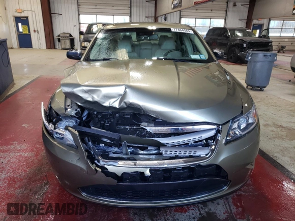 2012 Ford Taurus Limited with VIN 1FAHP2JW3CG142762, listed as a Copart auction lot 77864584 with 131,911 mi miles and Salvage title. Bid and sale history available at DreamBid. Image 5.