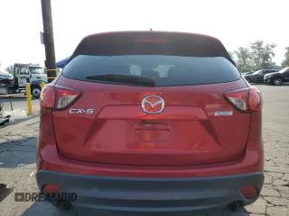2014 Mazda CX-5 Touring with VIN JM3KE2CY0E0309845, listed as a Copart auction lot 62193734 with 97,878 mi miles and Salvage Title. Bid and sale history available at carsss.com. Image 6.