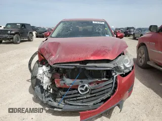 2016 Mazda CX-5 Sport with VIN JM3KE2BY8G0874641, listed as a Copart auction lot 51167845 with 104,571 mi miles and Clean Title. Bid and sale history available at carsss.com. Image 5.