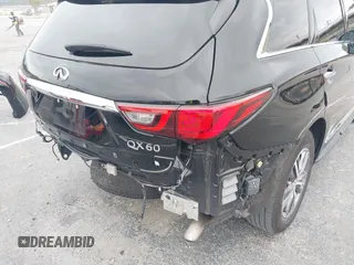 2020 Infiniti QX60 Luxe with VIN 5N1DL0MN2LC540608, listed as a IAAI auction lot 42187929 with 82,227 mi miles and . Bid and sale history available at DreamBid. Image 18.