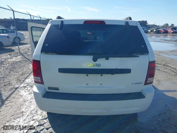 2005 Jeep Grand Cherokee Laredo with VIN 1J4GS48N75C505209, listed as a IAAI auction lot 41452637 with 263,653 mi miles. Bid and sale history available at carsss.com. Image 6.