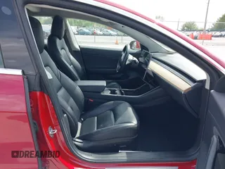 2018 Tesla Model 3 Long Range Battery with VIN 5YJ3E1EA8JF031683, listed as a IAAI auction lot 39275313 with 136,939 mi miles and . Bid and sale history available at DreamBid. Image 5.