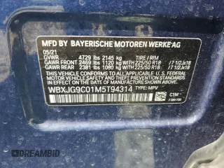 2021 BMW X1 xDrive28i with VIN WBXJG9C01M5T94314, listed as a Copart auction lot 60244134 with 43,933 mi miles and Salvage title. Bid and sale history available at DreamBid. Image 14.