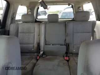 2005 Nissan Armada LE z VIN 5N1AA08A95N738884, wystawiony jako Copart lot #56823015 z przebiegiem 183 395 mil mil oraz Czysty tytuł • Clean title. Historia ofert i sprzedaży dostępna na DreamBid. Obrazek 10.