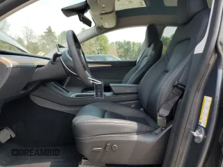 2023 Tesla Model Y Long Range with VIN 7SAYGDEE7PA031199, listed as a Copart auction lot 53876105 with 10,835 mi miles and Salvage Title. Bid and sale history available at DreamBid. Image 7.