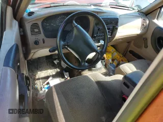 1999 Ford Ranger XL with VIN 1FTYR10C5XUB06570, listed as a Copart auction lot 51580125 with 246,020 mi miles and Salvage Title. Bid and sale history available at carsss.com. Image 8.