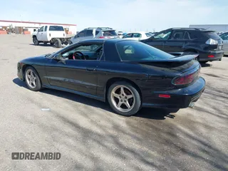 1997 Pontiac Firebird Trans Am with VIN 2G2FV22P7V2215905, listed as a IAAI auction lot 41764996 with 112,368 mi miles. Bid and sale history available at carsss.com. Image 3.