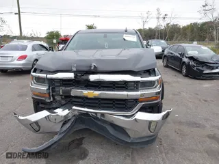 2016 Chevrolet Silverado 1500 LT with VIN 1GCRCREC7GZ109079, listed as a IAAI auction lot 40985730 with 162,630 mi miles. Bid and sale history available at carsss.com. Image 6.