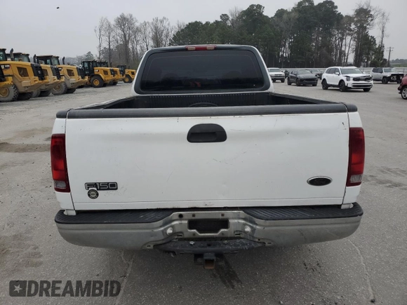 2000 Ford F-150 XL с VIN 1FTZX1725YNB58607, выставлен на аукционе Copart как лот 48706575 с пробегом 286 898 миль миль и Списание • Salvage title. История ставок и продаж доступна на DreamBid. Изображение 6.