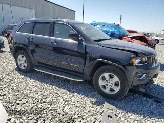 2015 Jeep Grand Cherokee Altitude with VIN 1C4RJEAG8FC668388, listed as a Copart auction lot 52360135 with 181,402 mi miles and Salvage Title. Bid and sale history available at carsss.com. Image 4.