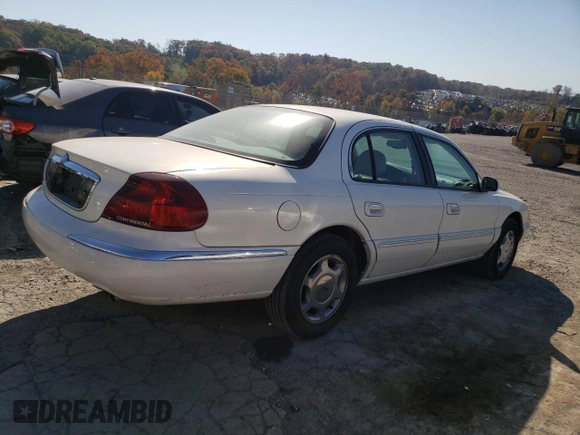 2002 Lincoln Continental with VIN 1LNHM97V62Y643532, listed as a Copart auction lot 76015984 with 154,374 mi miles and Salvage Title. Bid and sale history available at carsss.com. Image 3.