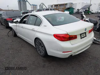 2018 BMW 5 Series 530e xDrive with VIN WBAJB1C50JG624043, listed as a IAAI auction lot 41814687 with 41,301 mi miles and . Bid and sale history available at DreamBid. Image 3.
