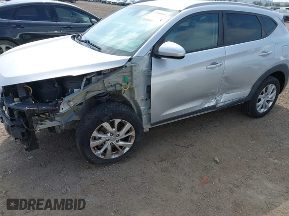 2019 Hyundai Tucson Value with VIN KM8J3CA46KU962082, listed as a IAAI auction lot 42160288 with 92,887 mi miles and . Bid and sale history available at DreamBid. Image 6.