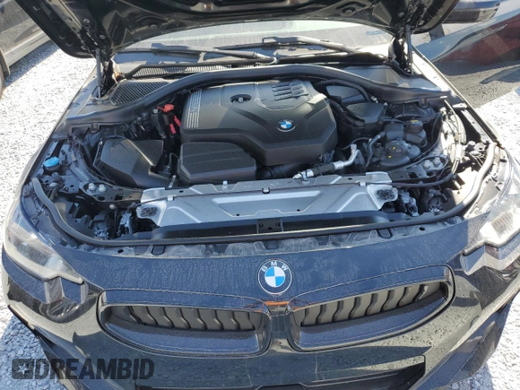2022 BMW 2 Series 230i with VIN 3MW23CM03N8C59765, listed as a Copart auction lot 44699035 with 14,101 mi miles and Salvage Title. Bid and sale history available at carsss.com. Image 11.