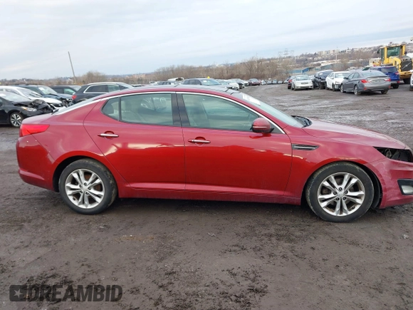 2013 Kia Optima EX z VIN 5XXGN4A78DG141924, wystawiony jako IAAI lot #41474952 z przebiegiem 172 814 mil mil oraz . Historia ofert i sprzedaży dostępna na DreamBid. Obrazek 12.