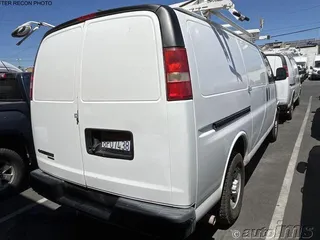 2014 Chevrolet Express Cargo with VIN 1GCWGFCA5E1181689, listed as a IAAI auction lot 42835597 with 157,826 mi miles and . Bid and sale history available at DreamBid. Image 2.