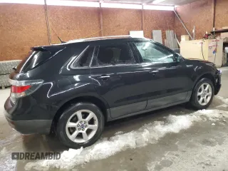 2011 Saab 9-4X z VIN 3G0FNREY1BS800412, wystawiony jako Copart lot #47351285 z przebiegiem 153 928 mil mil oraz Szkoda całkowita • Salvage title. Historia ofert i sprzedaży dostępna na DreamBid. Obrazek 3.