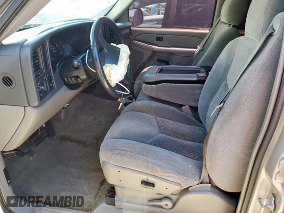 2004 Chevrolet Tahoe LS with VIN 1GNEC13Z24R310768, listed as a Copart auction lot 55886055 with 246,093 mi miles and Salvage title. Bid and sale history available at DreamBid. Image 7.