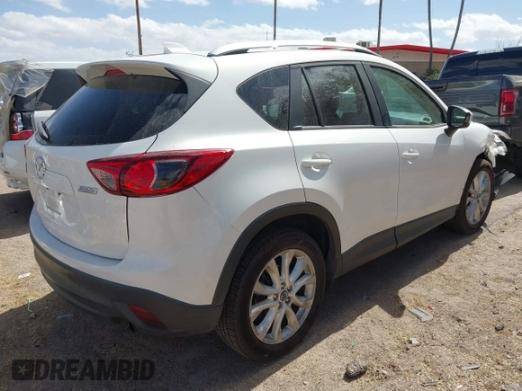 2013 Mazda CX-5 Grand Touring with VIN JM3KE4DE0D0148590, listed as a IAAI auction lot 41685993 with 189,843 mi miles. Bid and sale history available at carsss.com. Image 4.