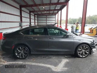 2015 Chrysler 200 C with VIN 1C3CCCCG5FN520080, listed as a IAAI auction lot 40432325 with 148,804 mi miles and . Bid and sale history available at carsss.com. Image 14.